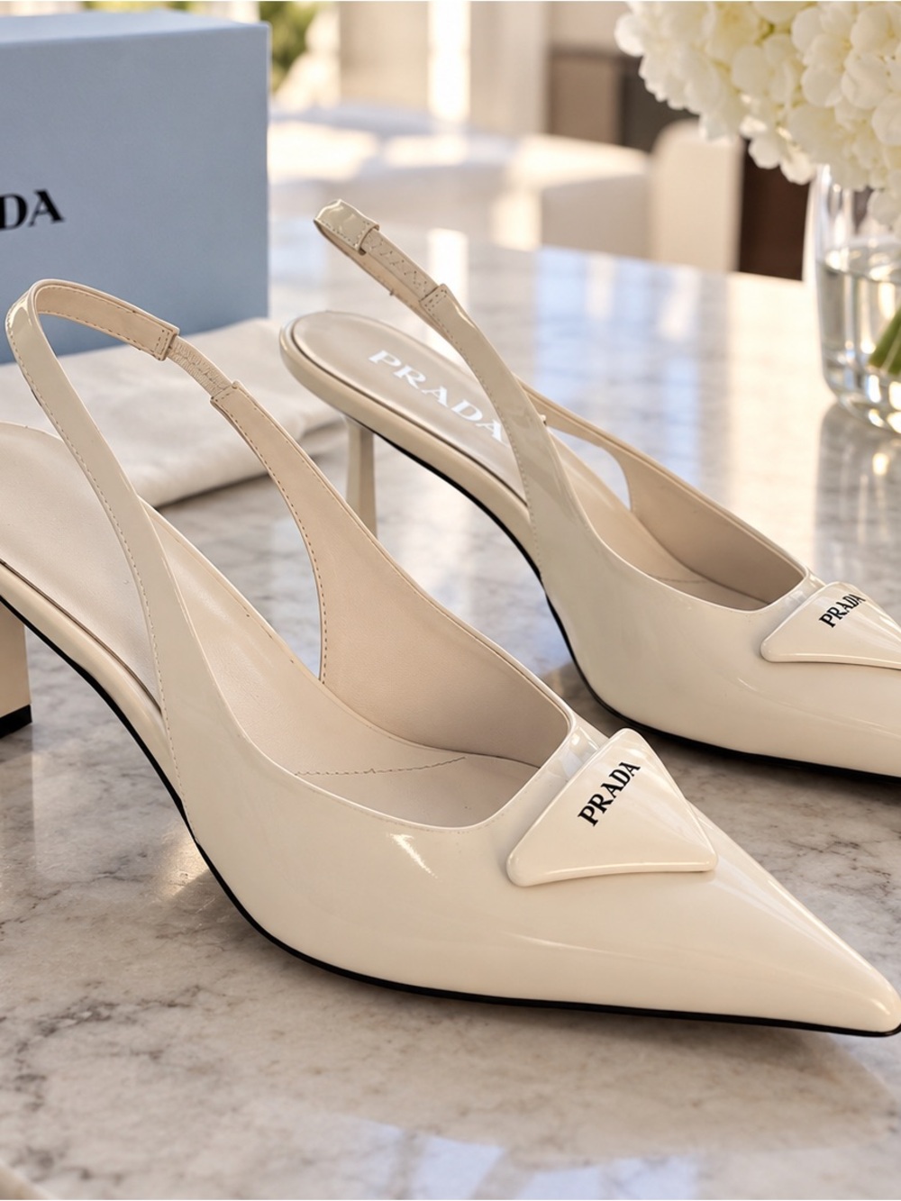 Prada Women's Cream Patent Slingback Pumps